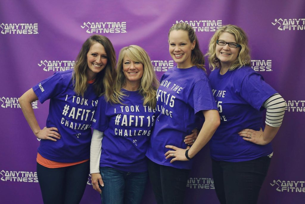 four ladies on purple background